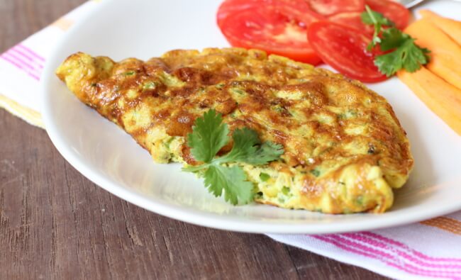 Omelete de ervas recheado com champignon Omelete de ervas recheado com champignon